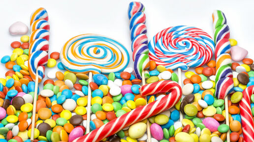 Colorful lollipops and different colorful round candy